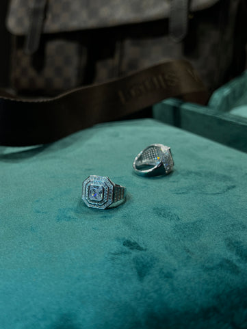 Royal Emerald-Cut Statement Ring on green velvet