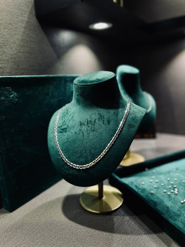 Imperial Link Chain displayed on green velvet